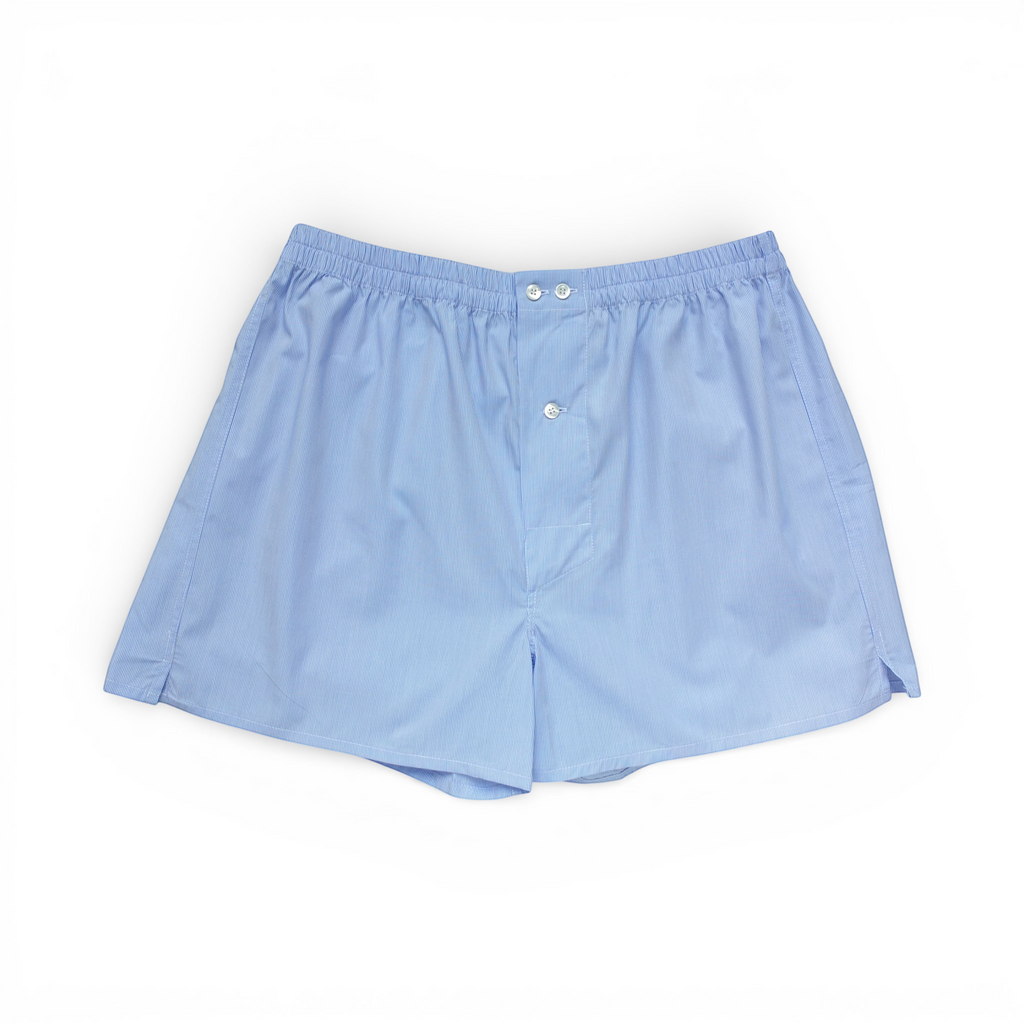 St Roch light blue cotton poplin boxer shorts with fine white pinstripes and button fly.
